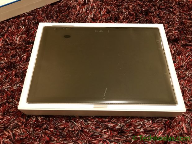 Figure 4. The Microsoft Surface Pro is carefully wrapped and sits flush with the top of the box. Very similar to how the Apple MacBook Pro is set in its box.